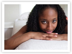 Woman laying on bed Hersolution Gel